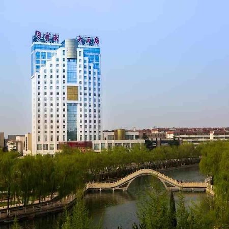 Feicheng Blossom Hotel Extérieur photo