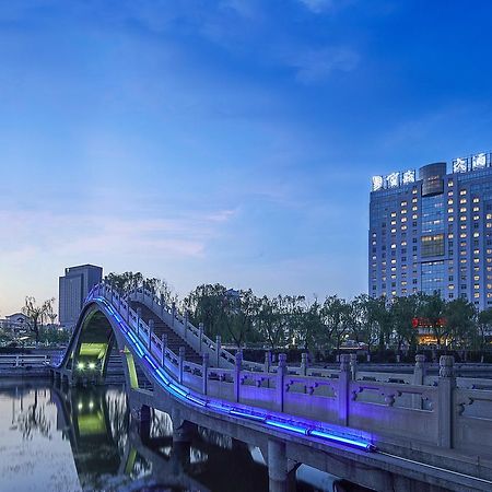 Feicheng Blossom Hotel Extérieur photo