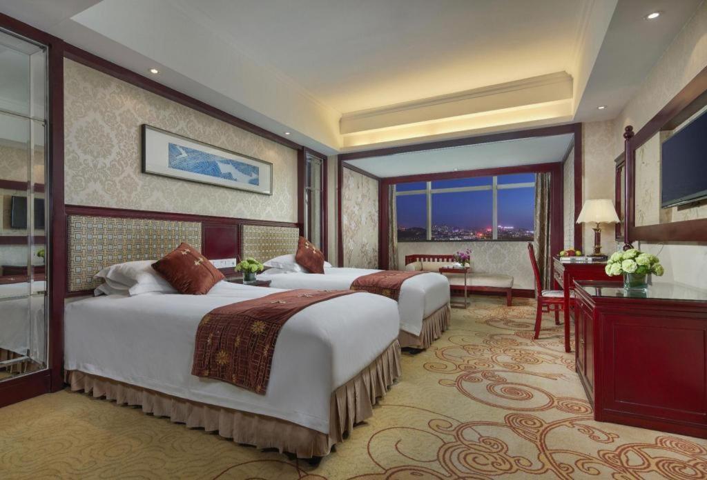 Feicheng Blossom Hotel Extérieur photo