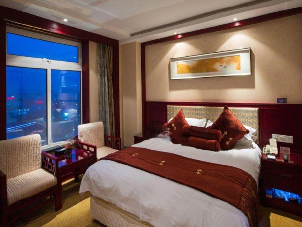 Feicheng Blossom Hotel Extérieur photo