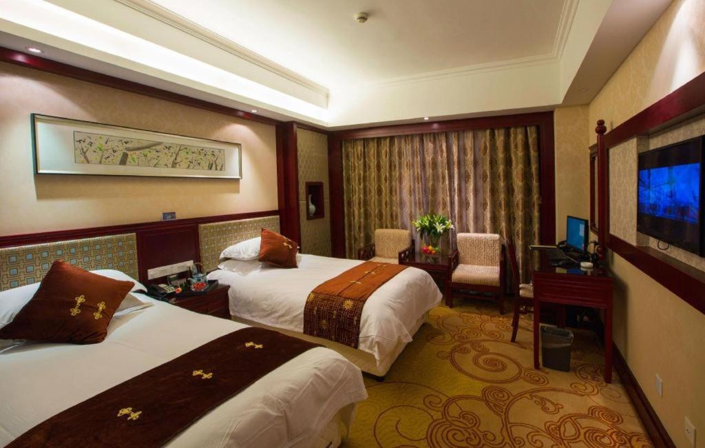 Feicheng Blossom Hotel Extérieur photo