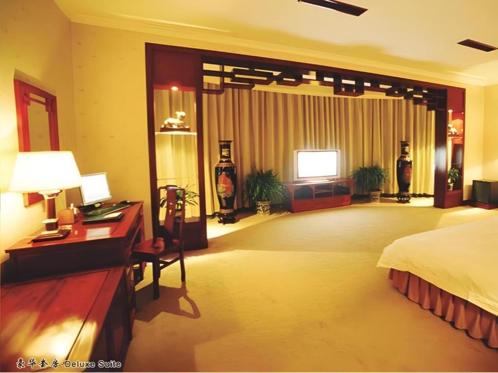 Feicheng Blossom Hotel Extérieur photo