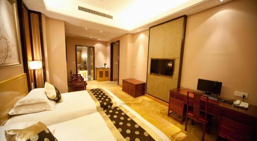 Feicheng Blossom Hotel Extérieur photo