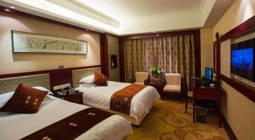 Feicheng Blossom Hotel Extérieur photo