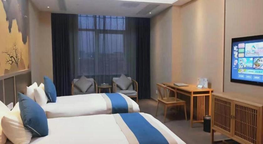 Feicheng Blossom Hotel Extérieur photo