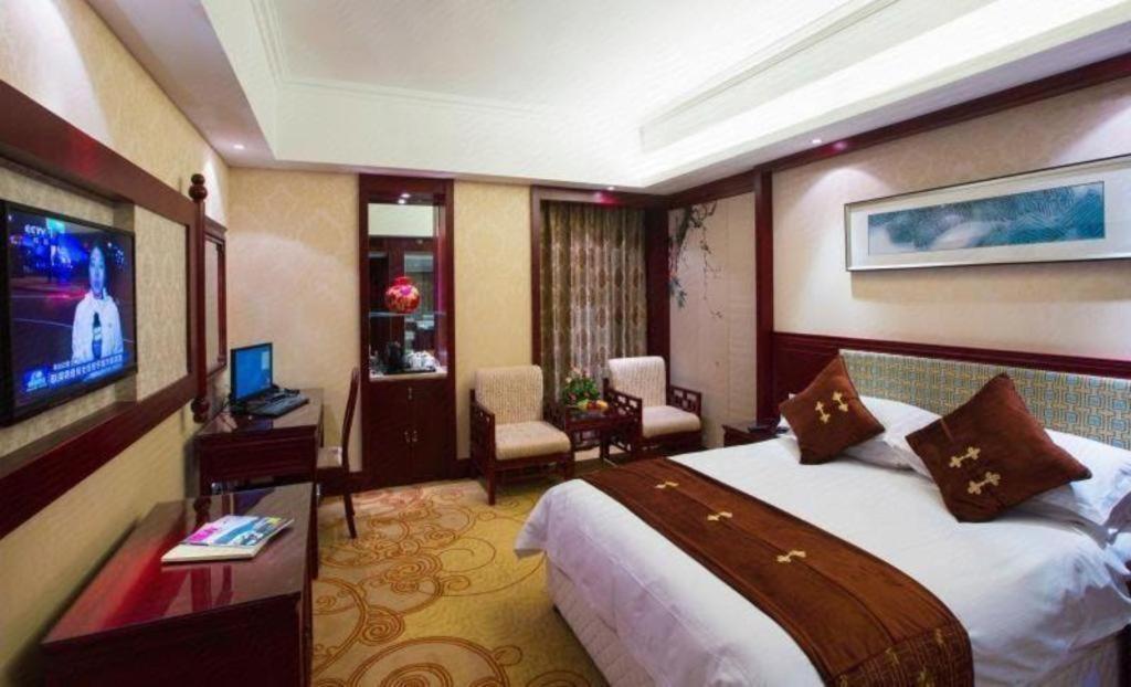 Feicheng Blossom Hotel Extérieur photo