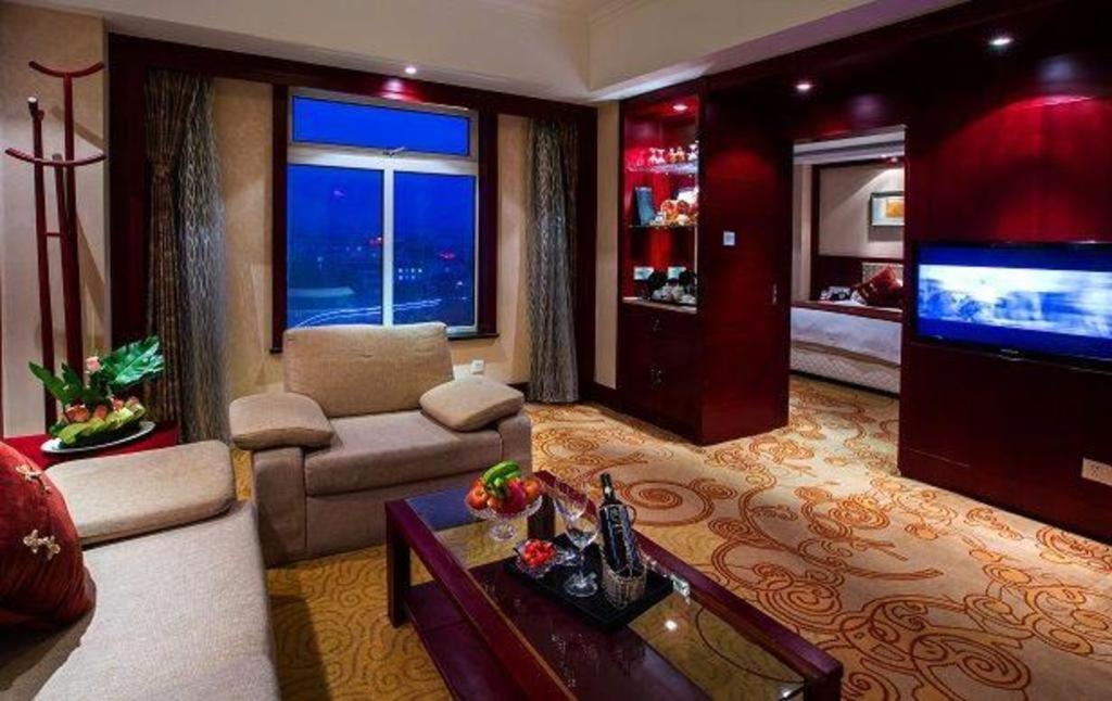 Feicheng Blossom Hotel Extérieur photo
