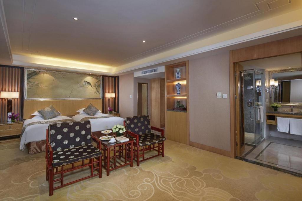 Feicheng Blossom Hotel Extérieur photo