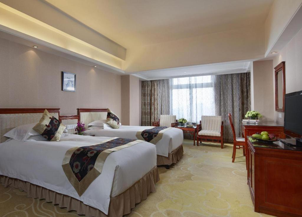 Feicheng Blossom Hotel Extérieur photo