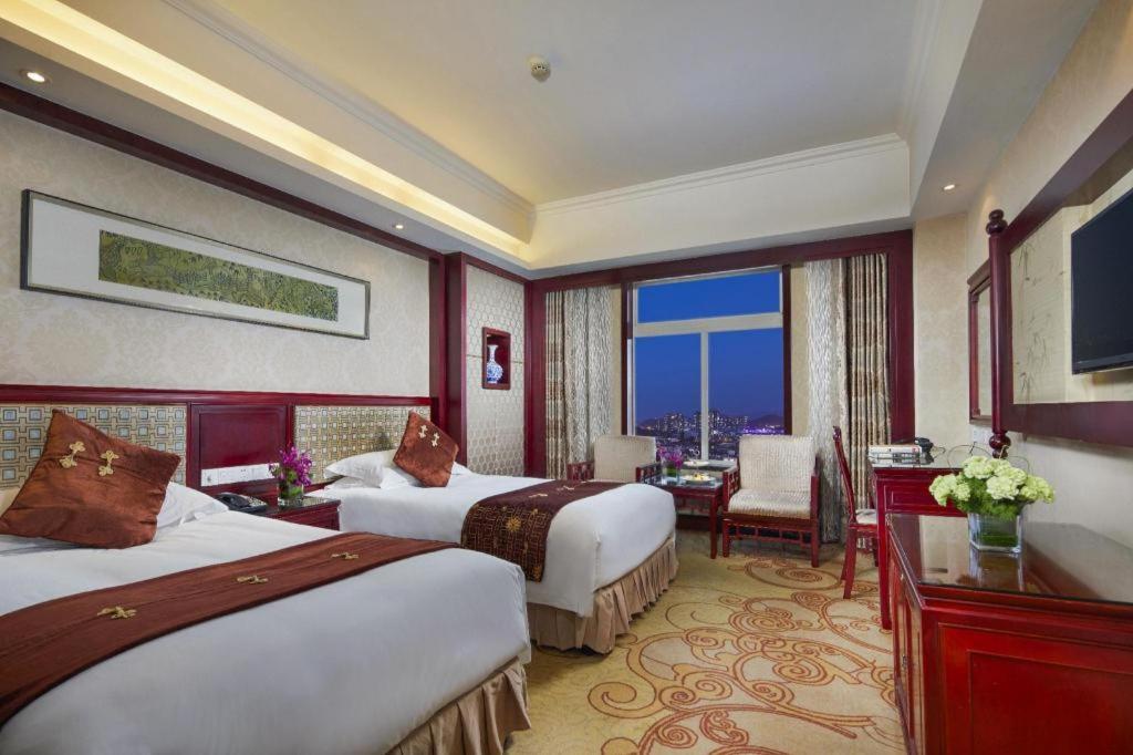 Feicheng Blossom Hotel Extérieur photo