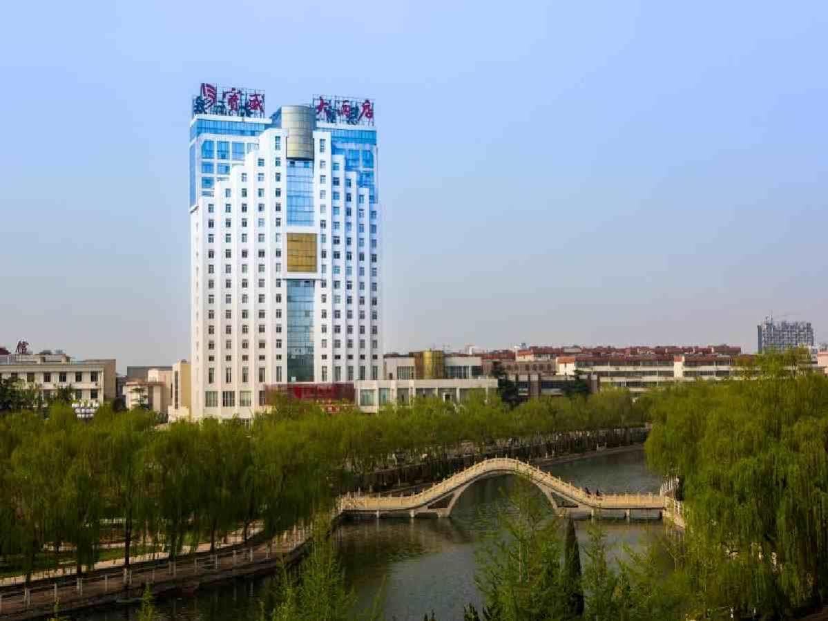 Feicheng Blossom Hotel Extérieur photo